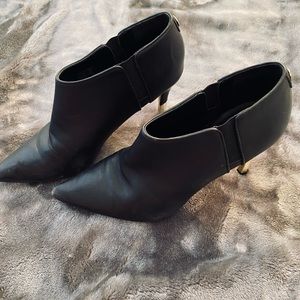 Black ankle booties.